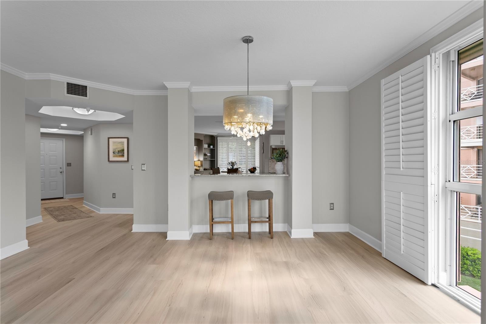 Dining Area Looking back towards Kitchen and Entry