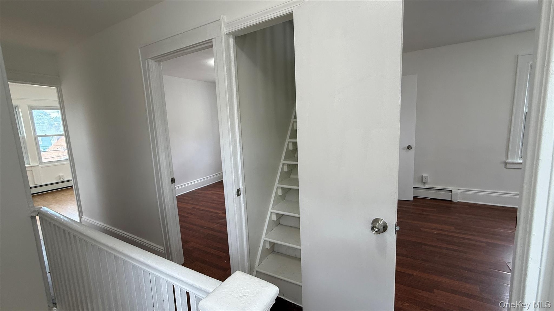 Hallway and staircase to attic
