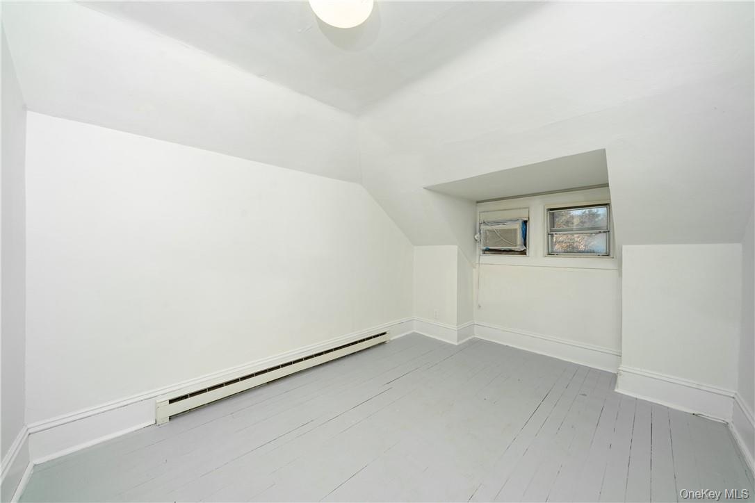Bonus Third Floor Room offers lots of possibilities! Additional storage space too! Full lower level offers lots and lots of storage!