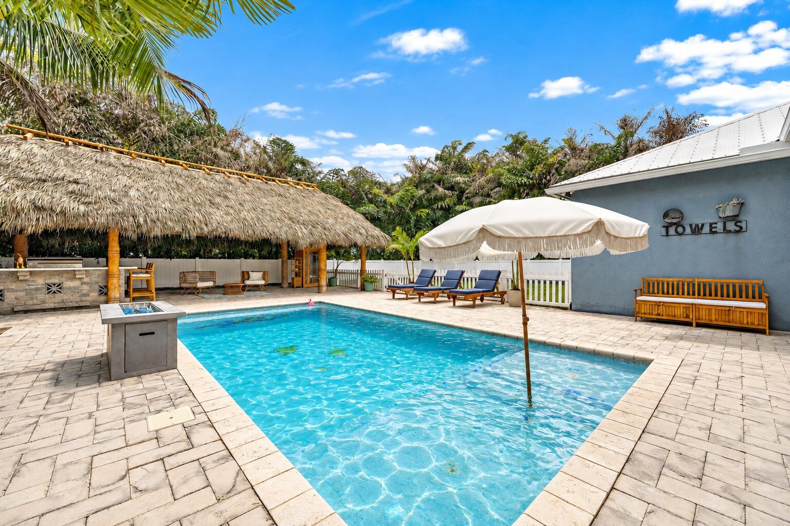 Unbeatable, Private Outdoor Oasis is ready for your enjoyment! Pool + Tiki Hut + Sauna + Summer Kitchen + More!