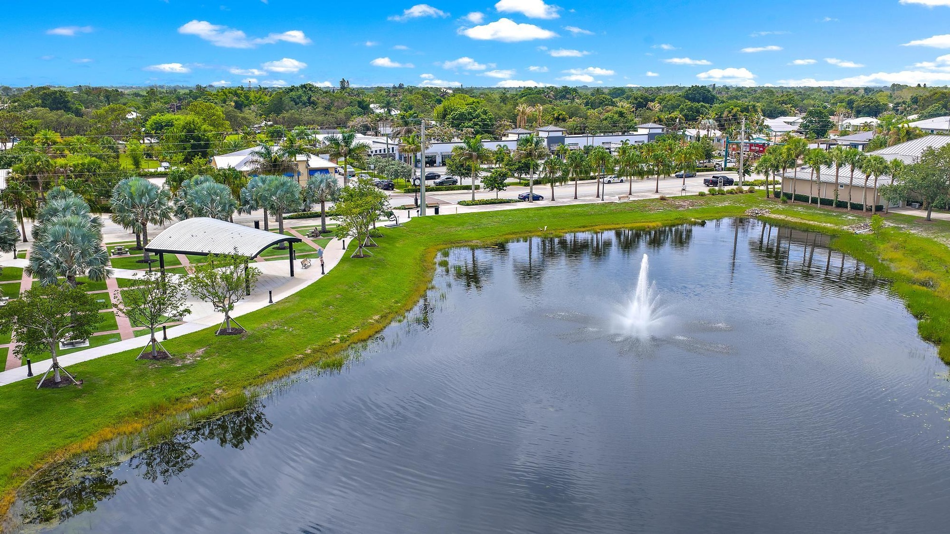 Along with a peaceful sunset view, the Community Pavilion area includes: Shaded event pavilion bandstand, walking paths, concrete ping pong tables, co