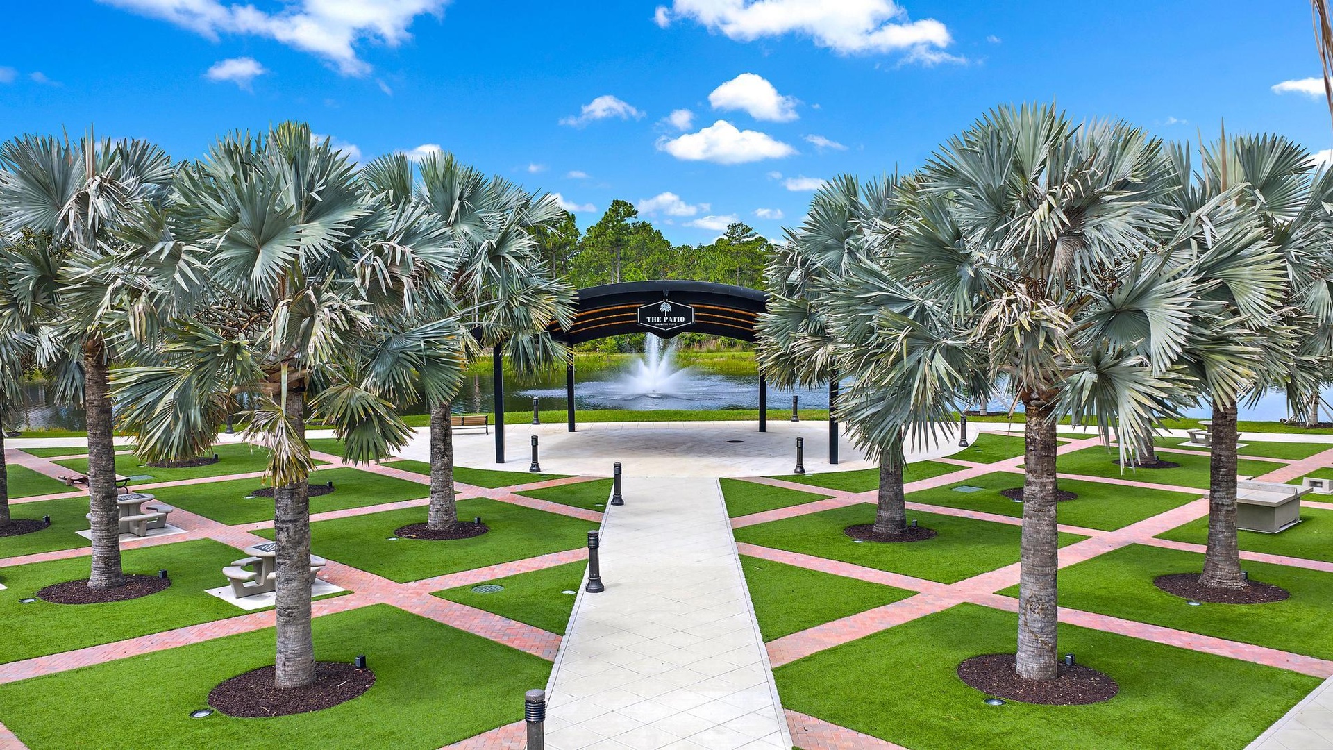 Welcome to the Patio at Palm City Place! a Newly Redesigned Community Park with open air Pavilion, Walking Path, Games, Lake and more! Enjoy Community