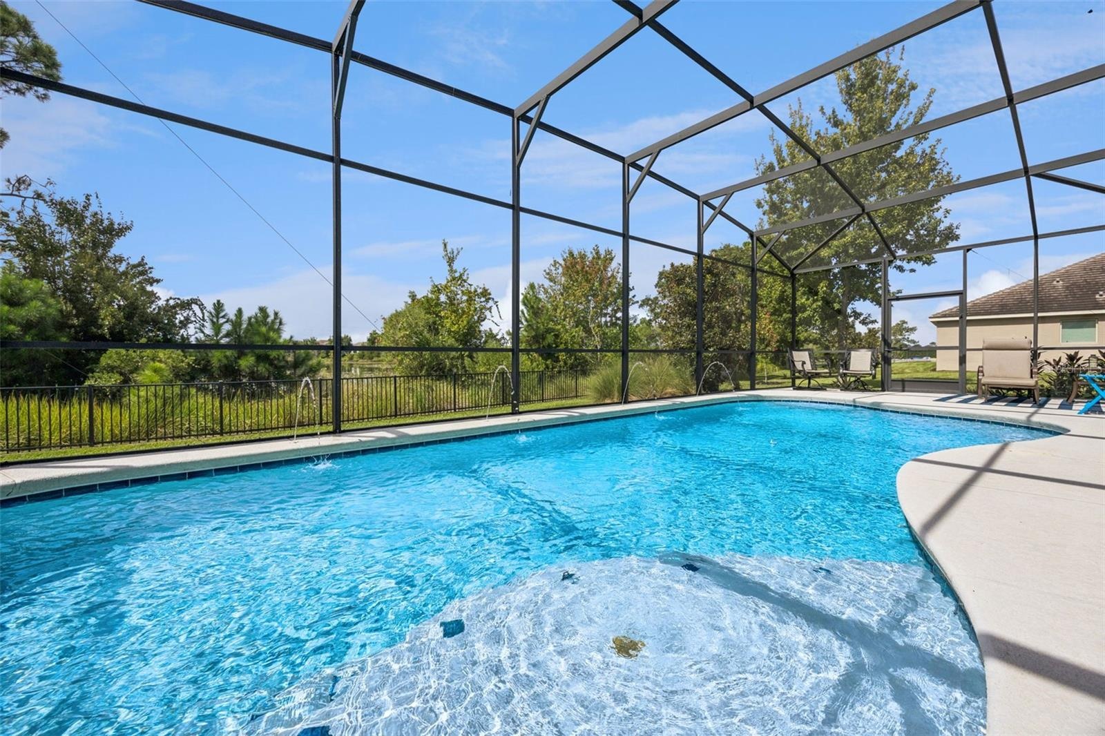Screened Pool surrounded by Nature!