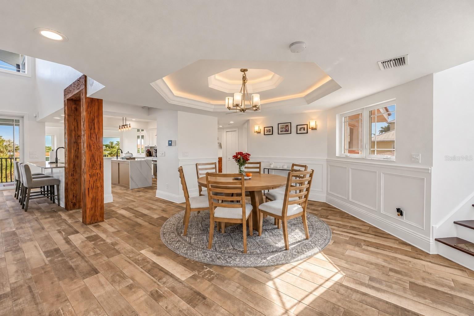 Dining with cove lighting and custom Millwork