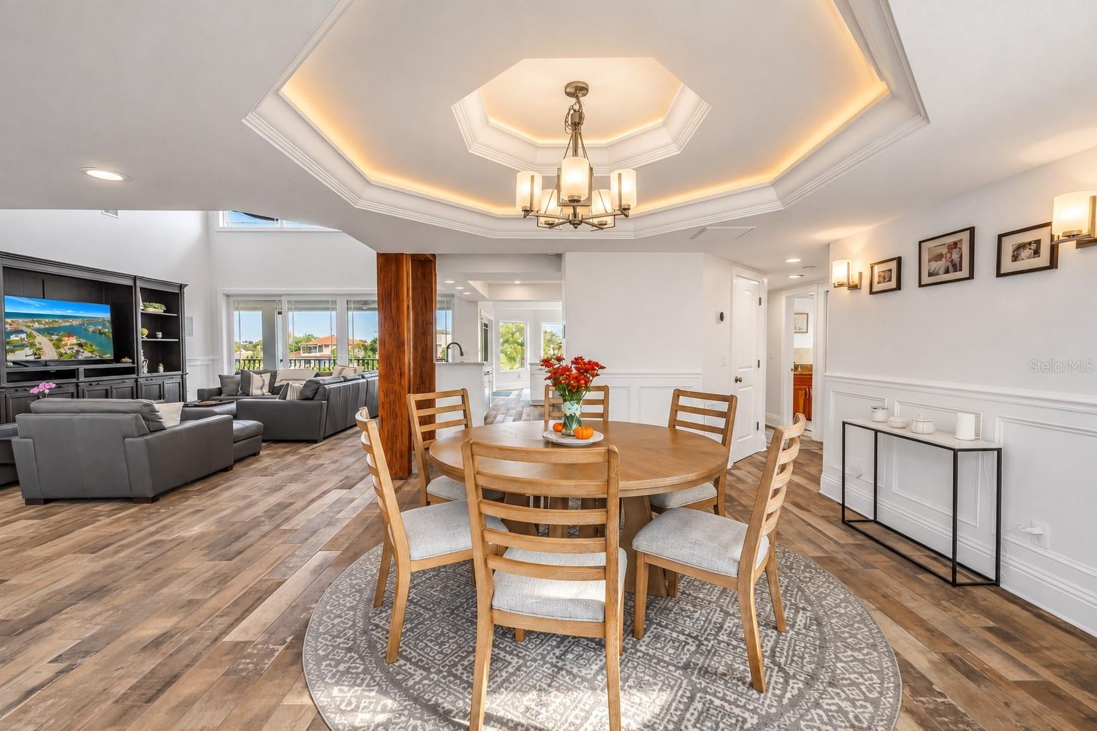 Dining with cove lighting and custom Millwork