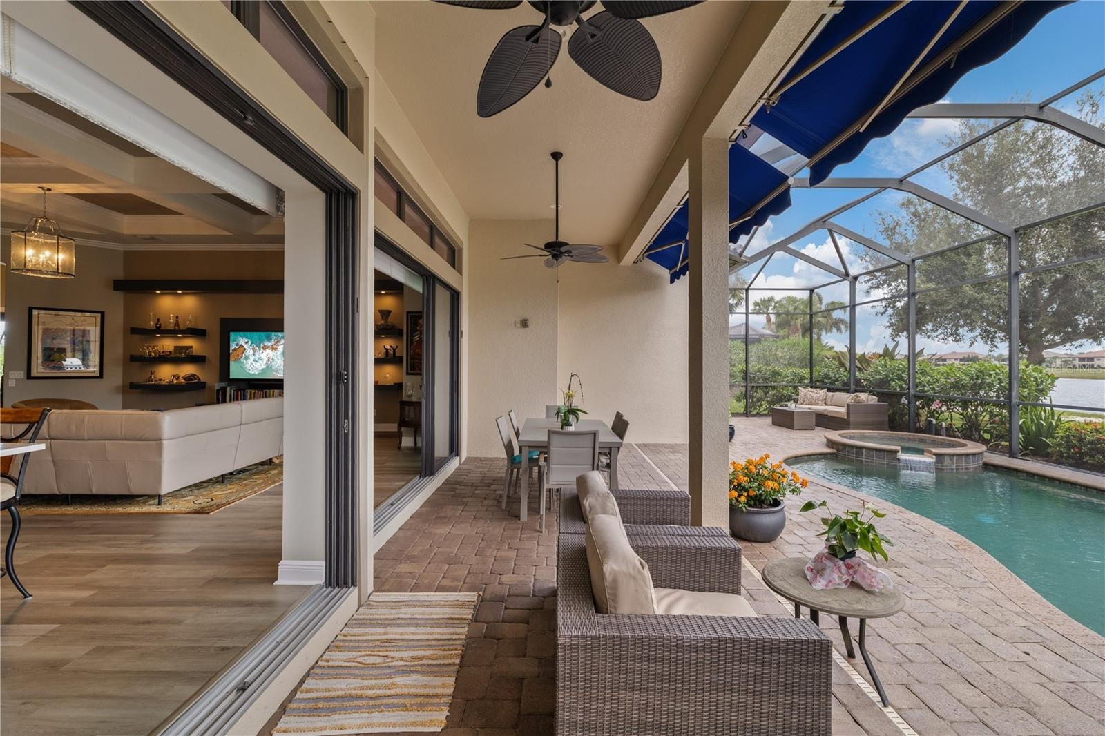 Lanai showing electric shades partially extended