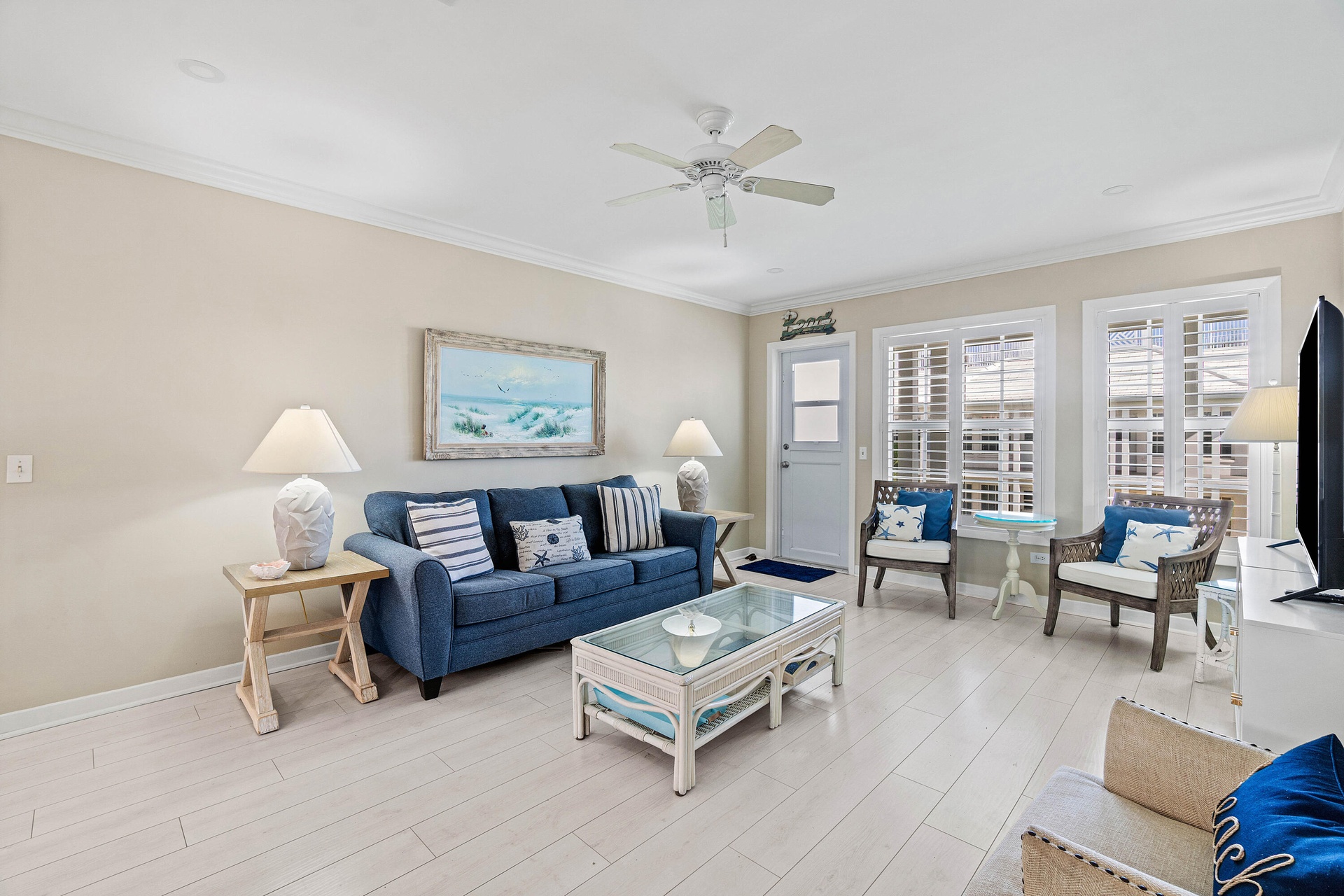Recessed lighting, wood-finish flooring, ceiling fan, crown molding, and plantation shutters