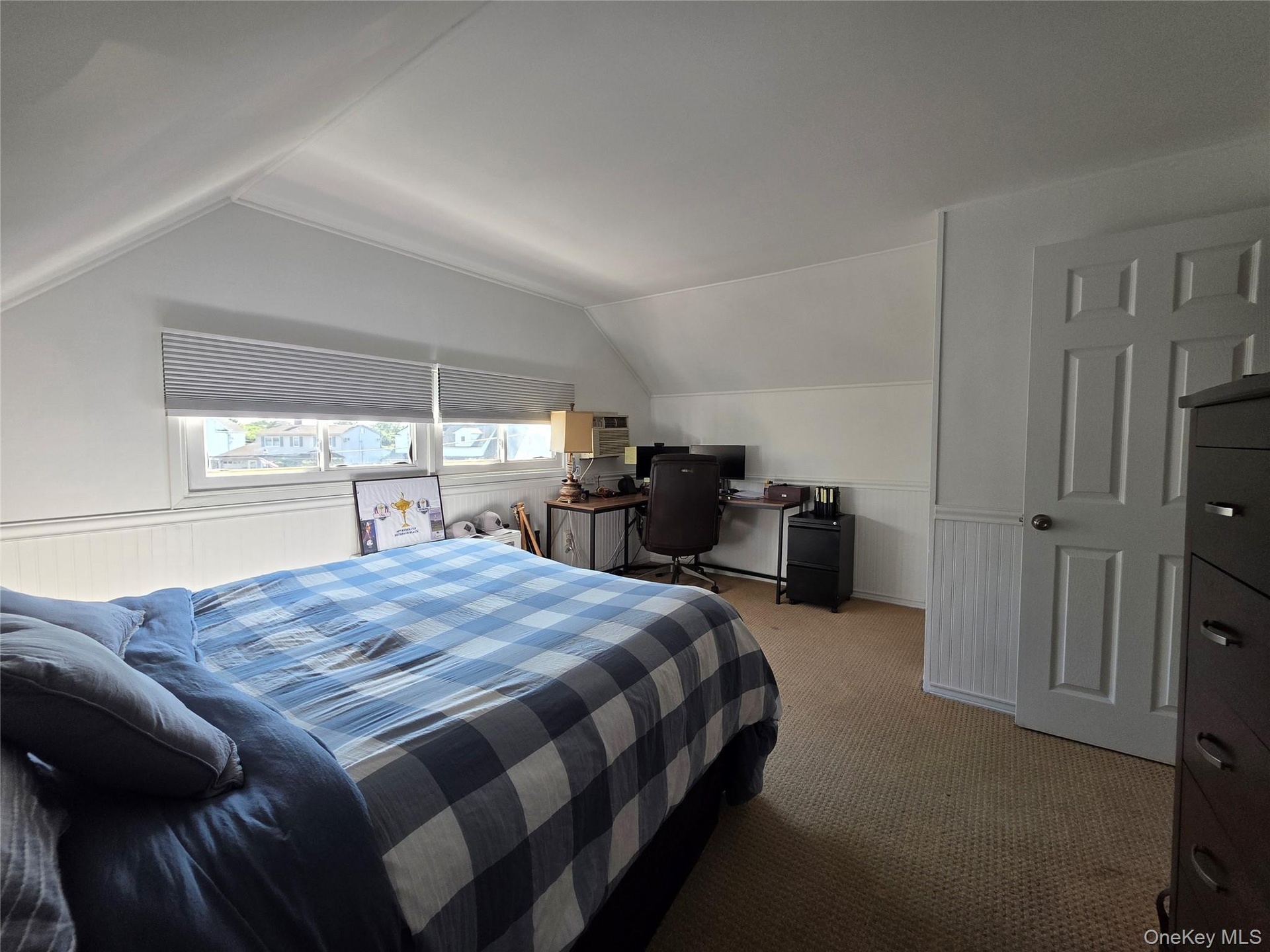 Bedroom 4 - Freshly painted in 2026 - 1 A/C wall unit - newly designed closet with access to crawl space for extra storage - new blinds - carpet