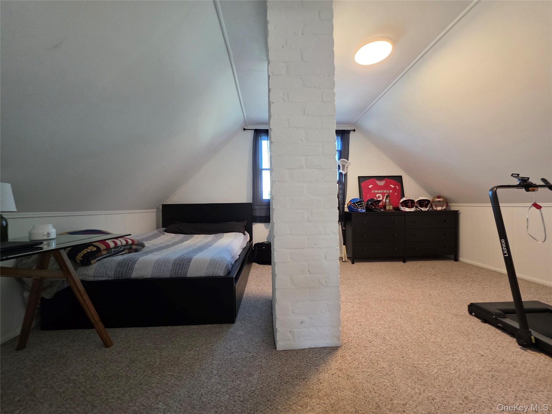 Bedroom 3 - Freshly painted in 2026 - 1 A/C window unit - closet with scuttle attic access for extra storage - carpet