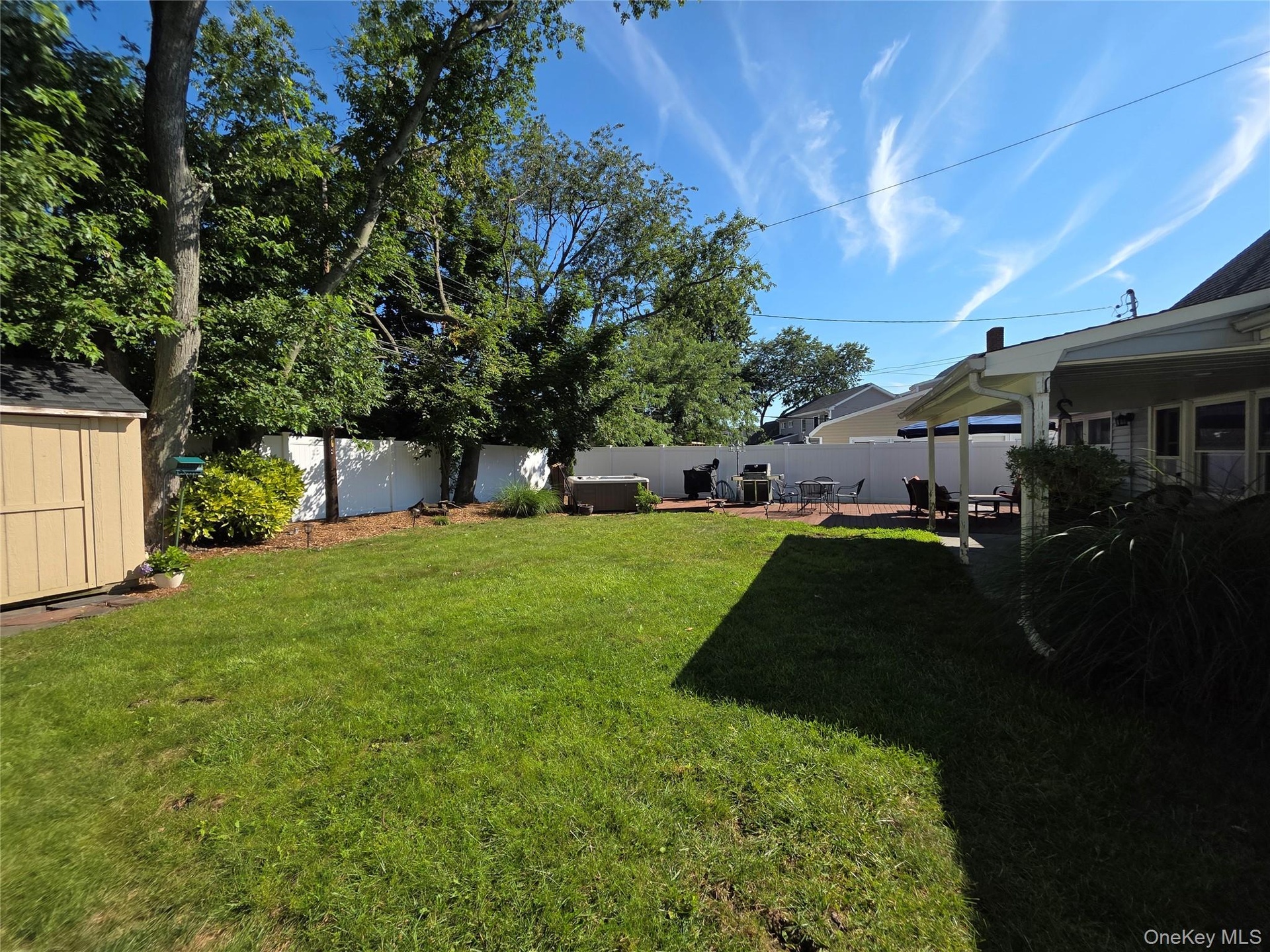 Perfectly flat yard with a wood shed for extra storage!
