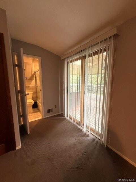 with sliders to outside and extra door to the bathroom