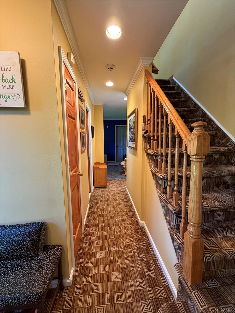 stairway and hallway from the front door, to the den? Dining room? Office?