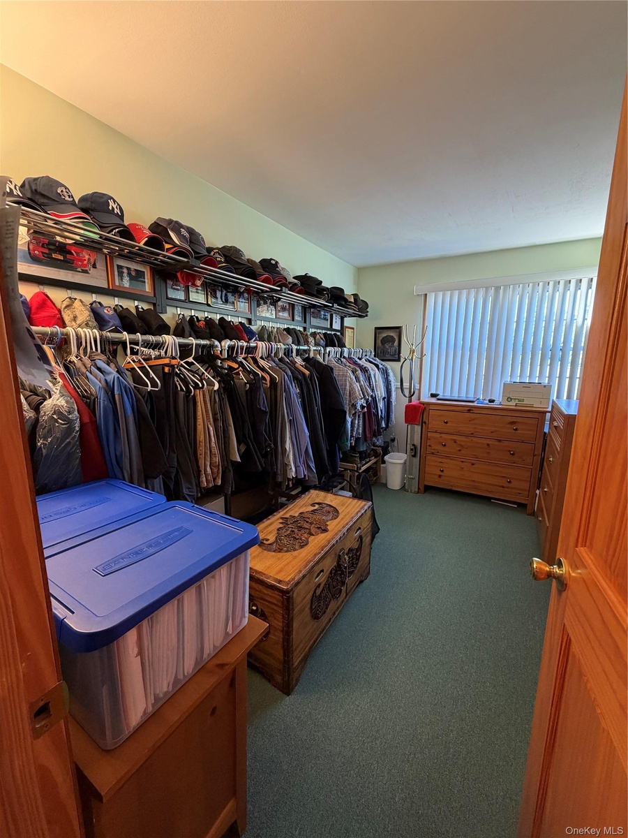 1 of 3 upstairs bedrooms besides the primary bdrm