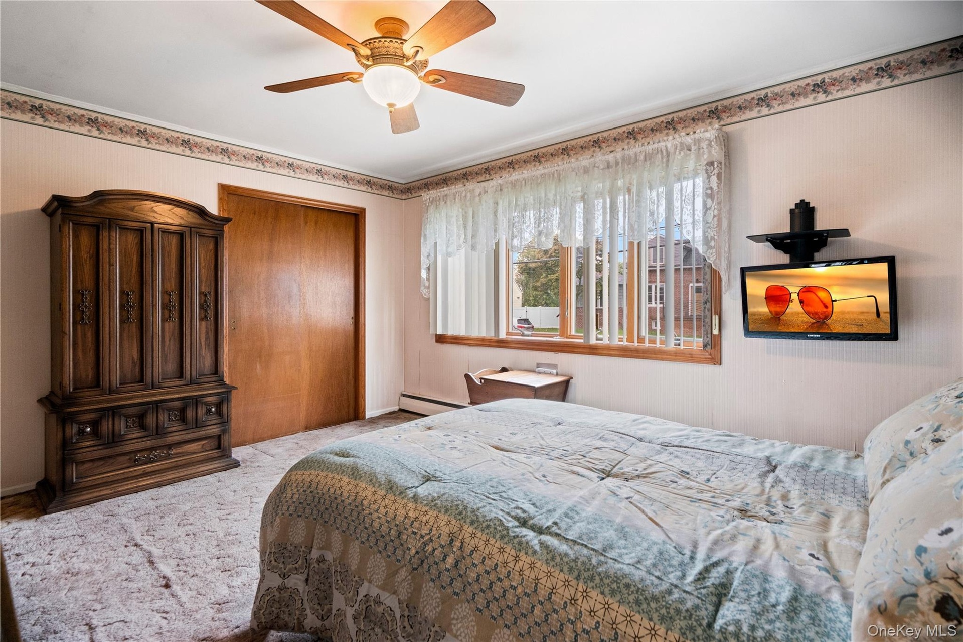 The primary bedroom also has a bow window for lots of natural light and features a large, double closet.
