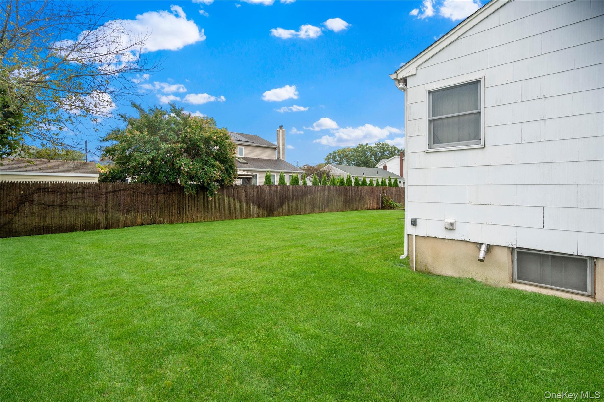 This is the view from the left side of the home, looking towards the back yard.