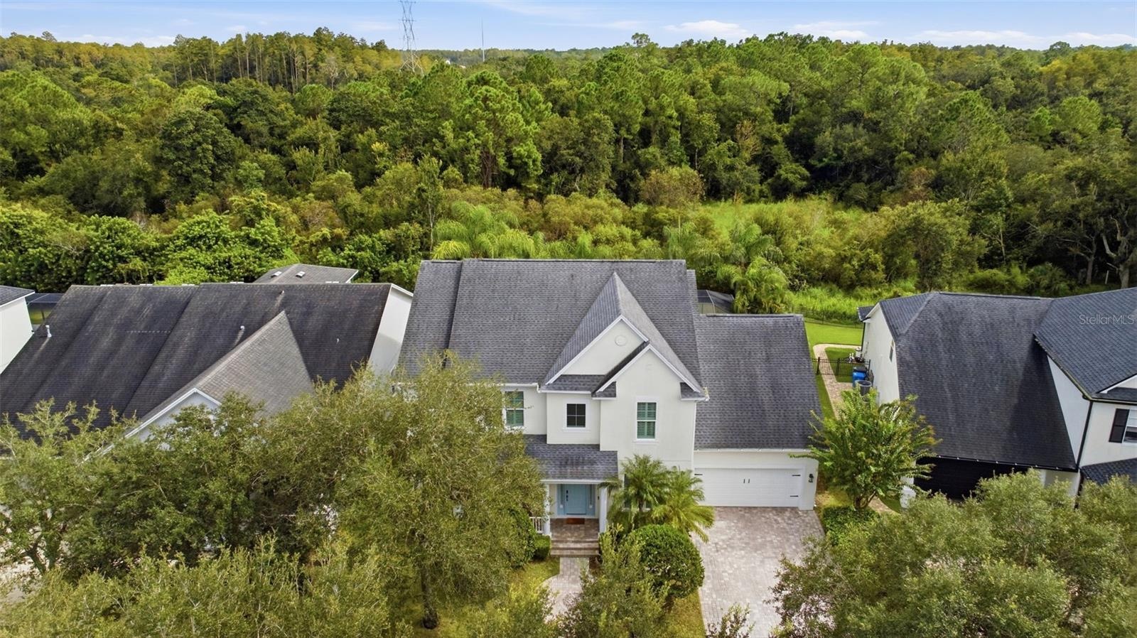 The nature preserve behind this home offers peace & privacy