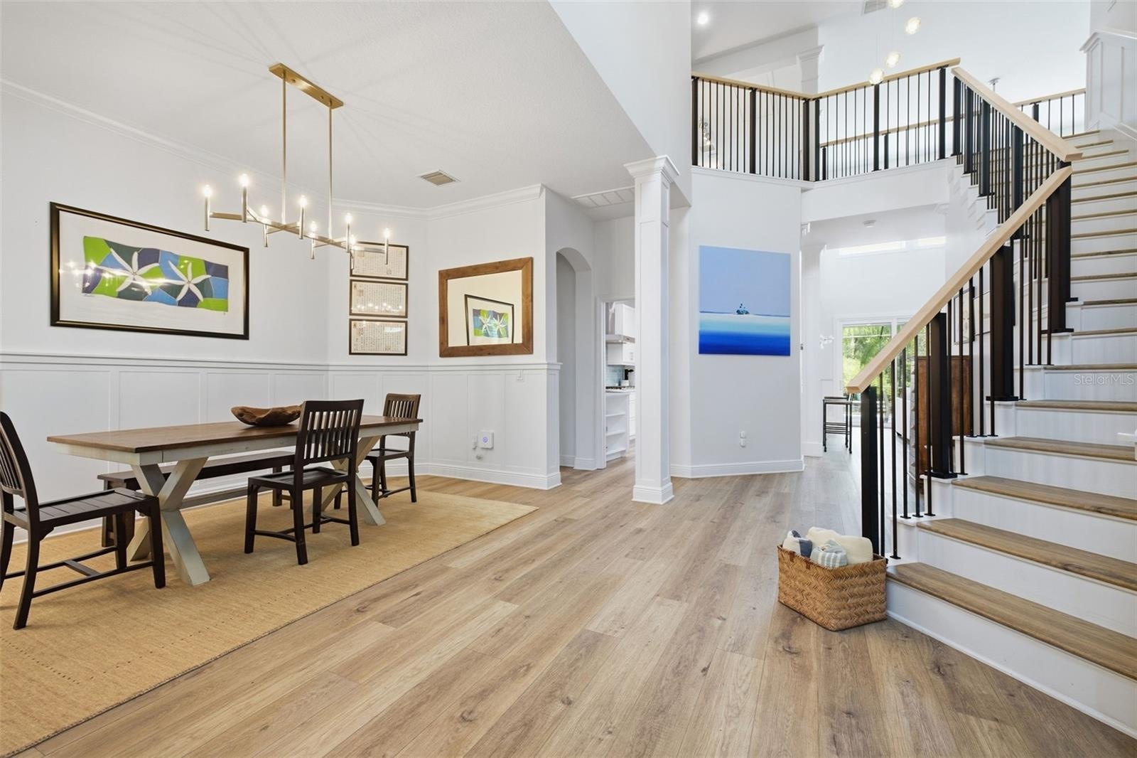 Bright & airy 2 story foyer opens up to the dining room on the left & office on the right