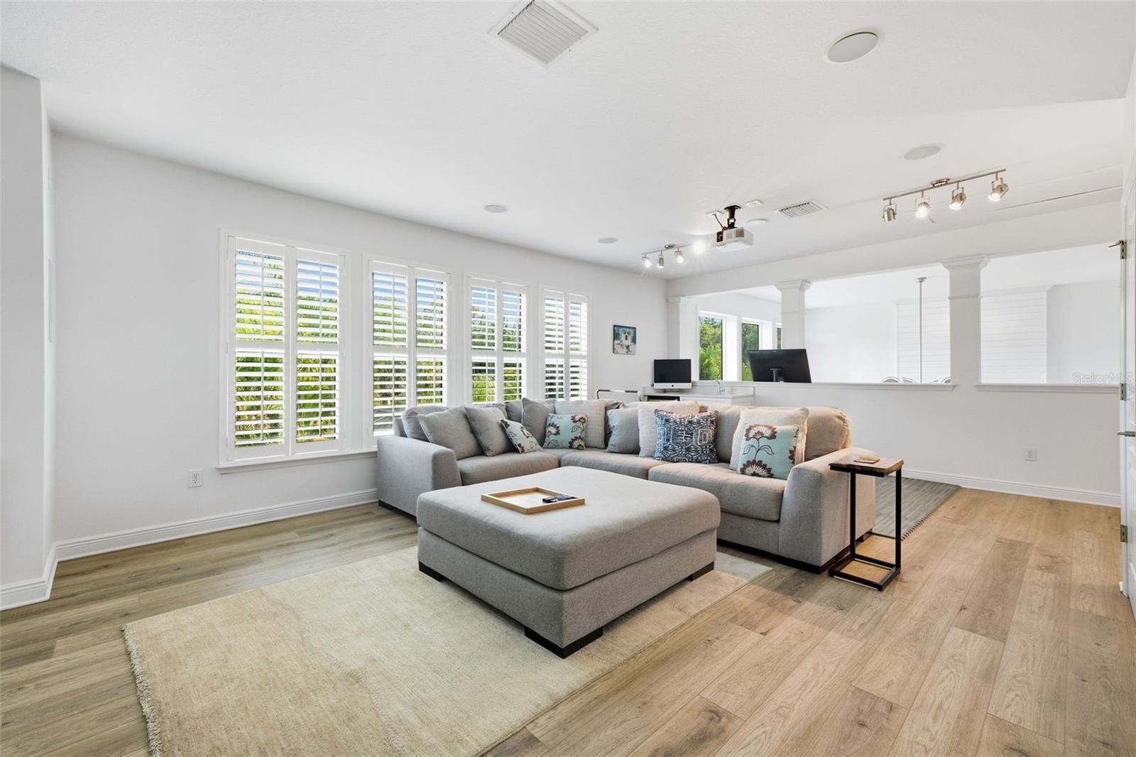 Second floor loft has endless possibilities: media room, home gym, playroom, home-schooling classroom...