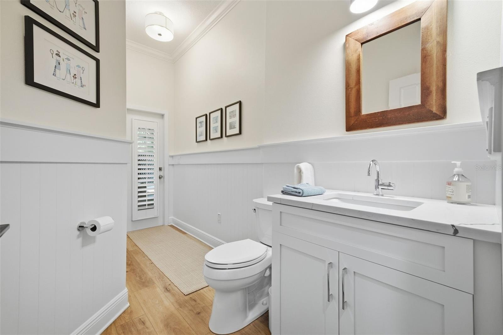 Half bath accessible from the patio/ pool area