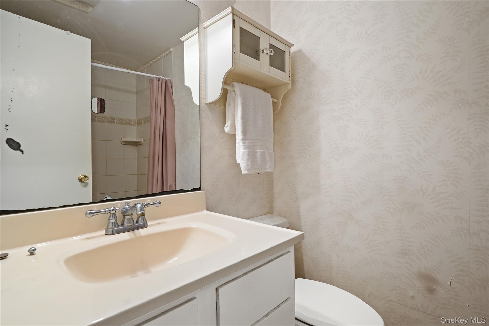 Legal full bathroom in the finished lower level.