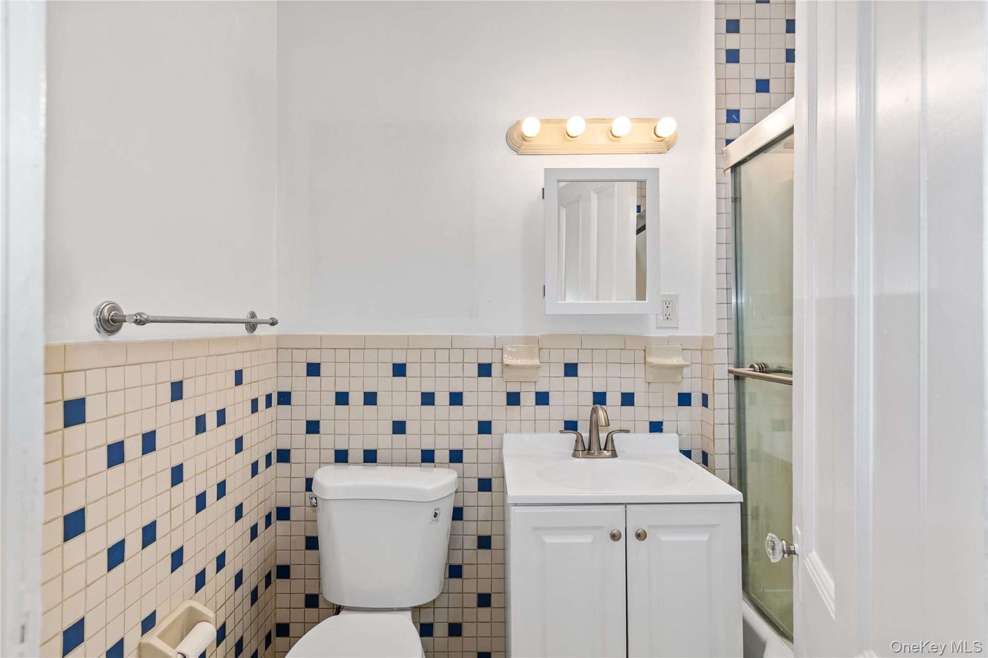 First floor bathroom, refreshed in the past 2 years.