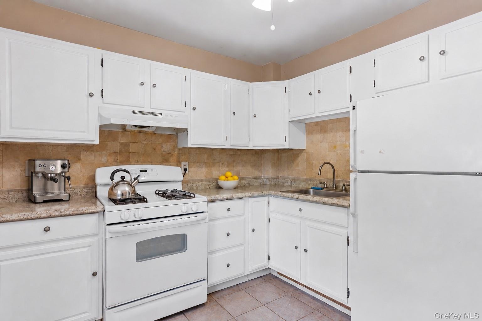 2nd floor kitchen, large enough for a table.
