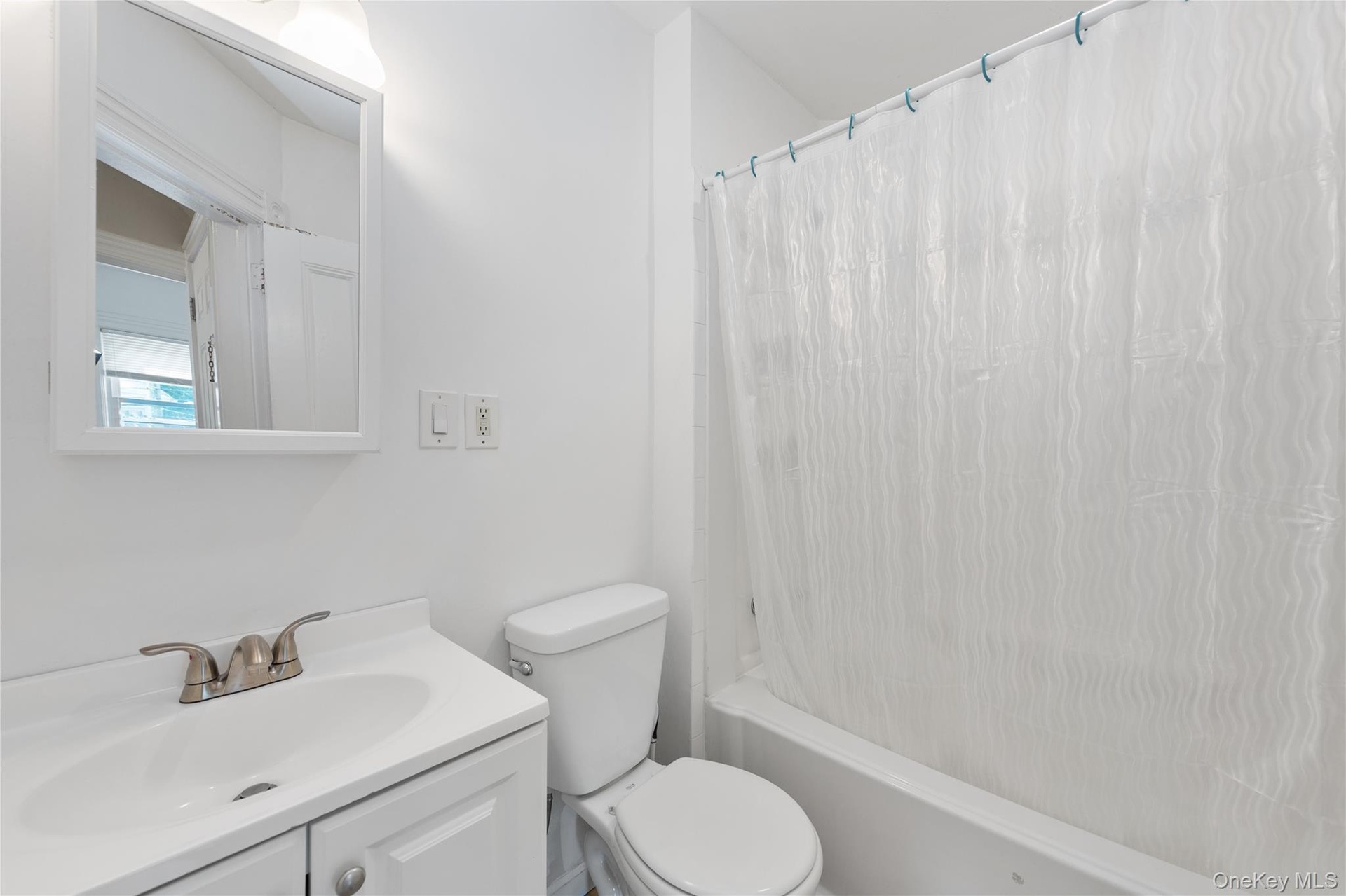 2nd Floor Bathroom,  includes new tub/shower surround,  Delta shower finished.