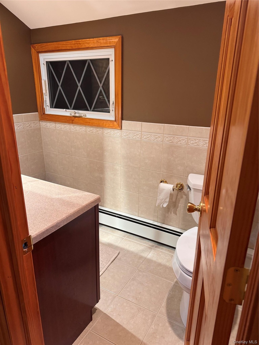 Hall half bath, toilet and sink,
