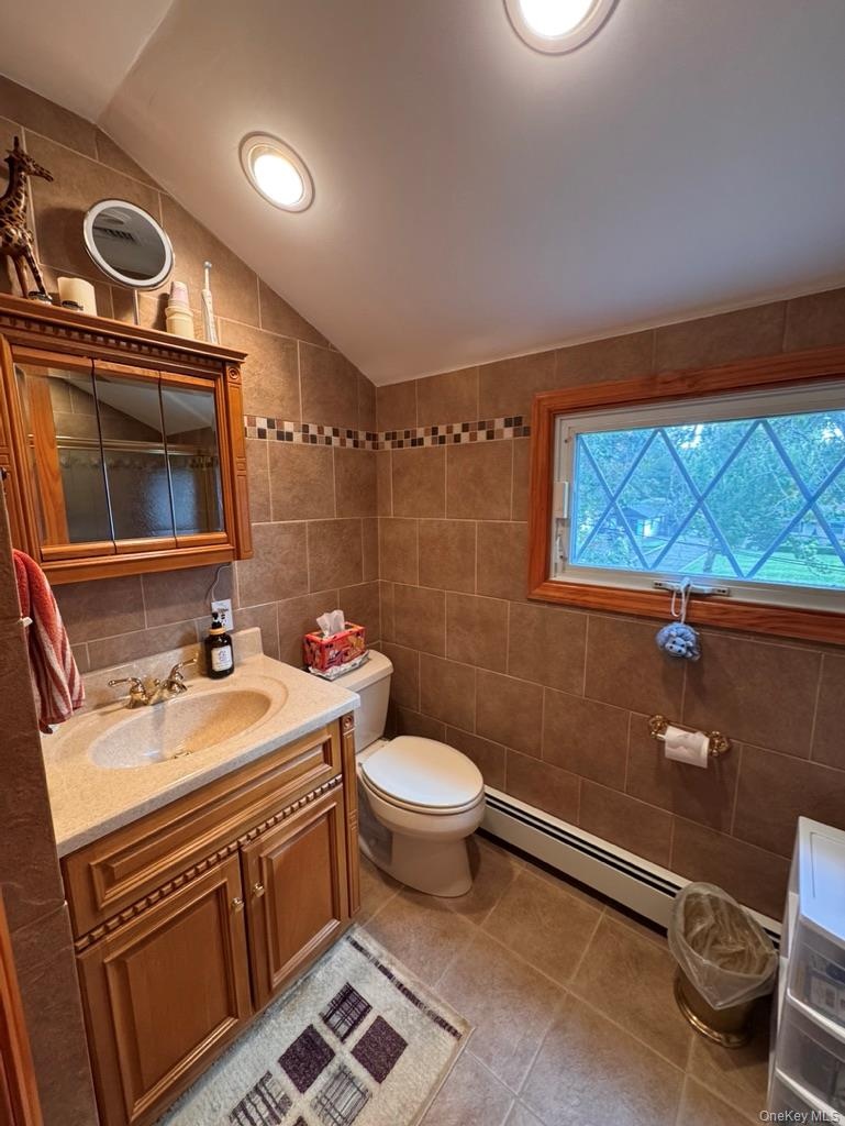 Hall bath upstairs, shower, toilet, sink, lovely window