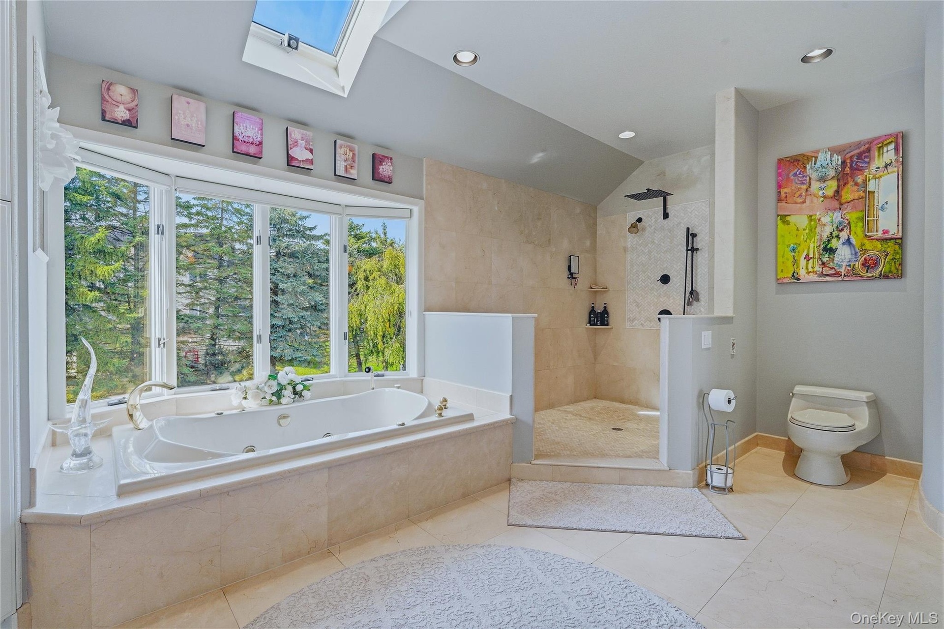Jetted soaking tub with a bay window, walk-in European shower with a rainfall showerhead, skylight, and recessed lighting, marble flooring