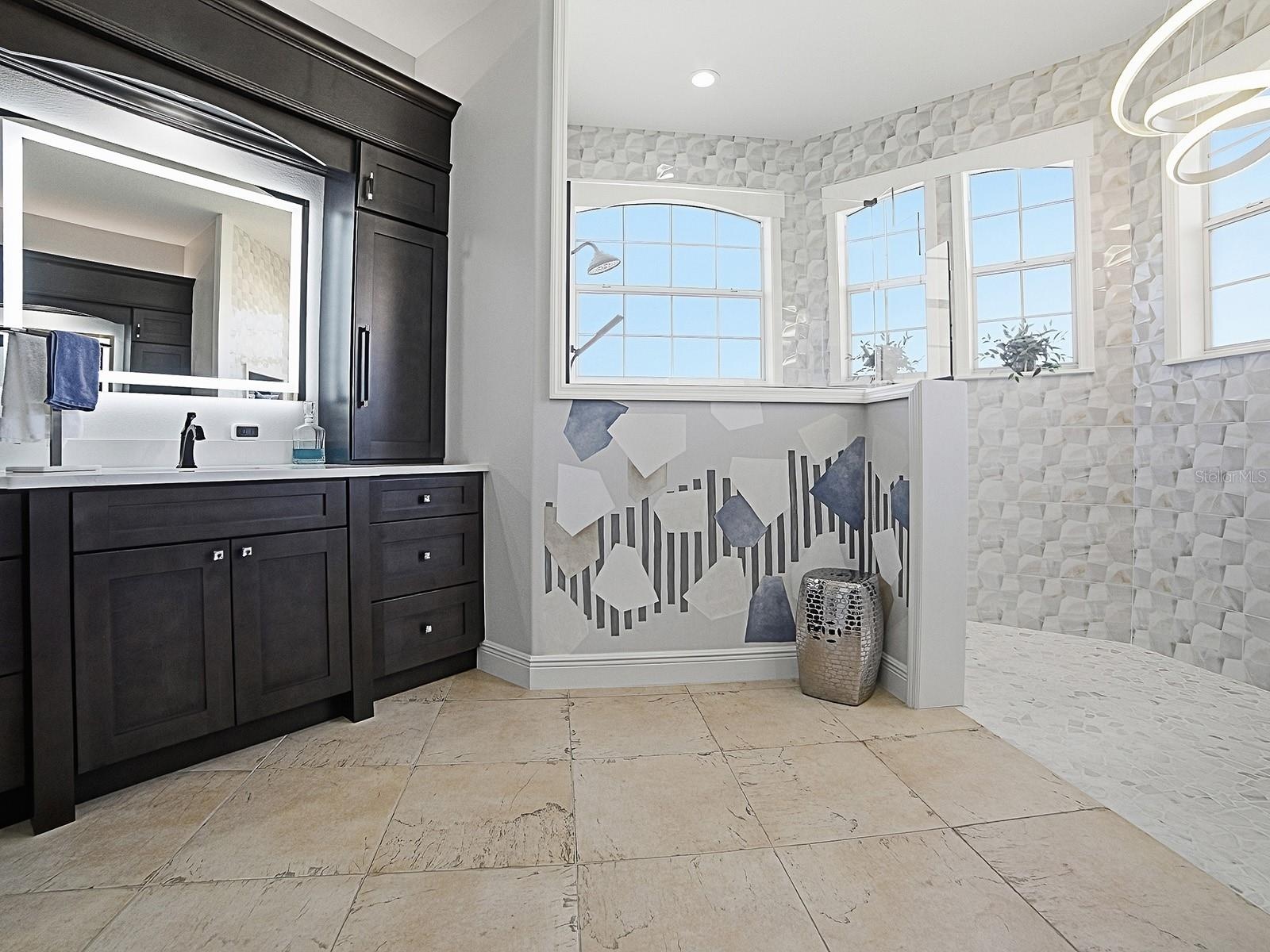 BEAUTIFUL RENOVATED BATH WITH WALK-N SHOWER WITH SHAVING MIRROR, LIGHTED MIRRORS, AND EVEN ELECTRICITY IN THE CABINETS FOR HAIRDRYERS AND SMALL APPLIA