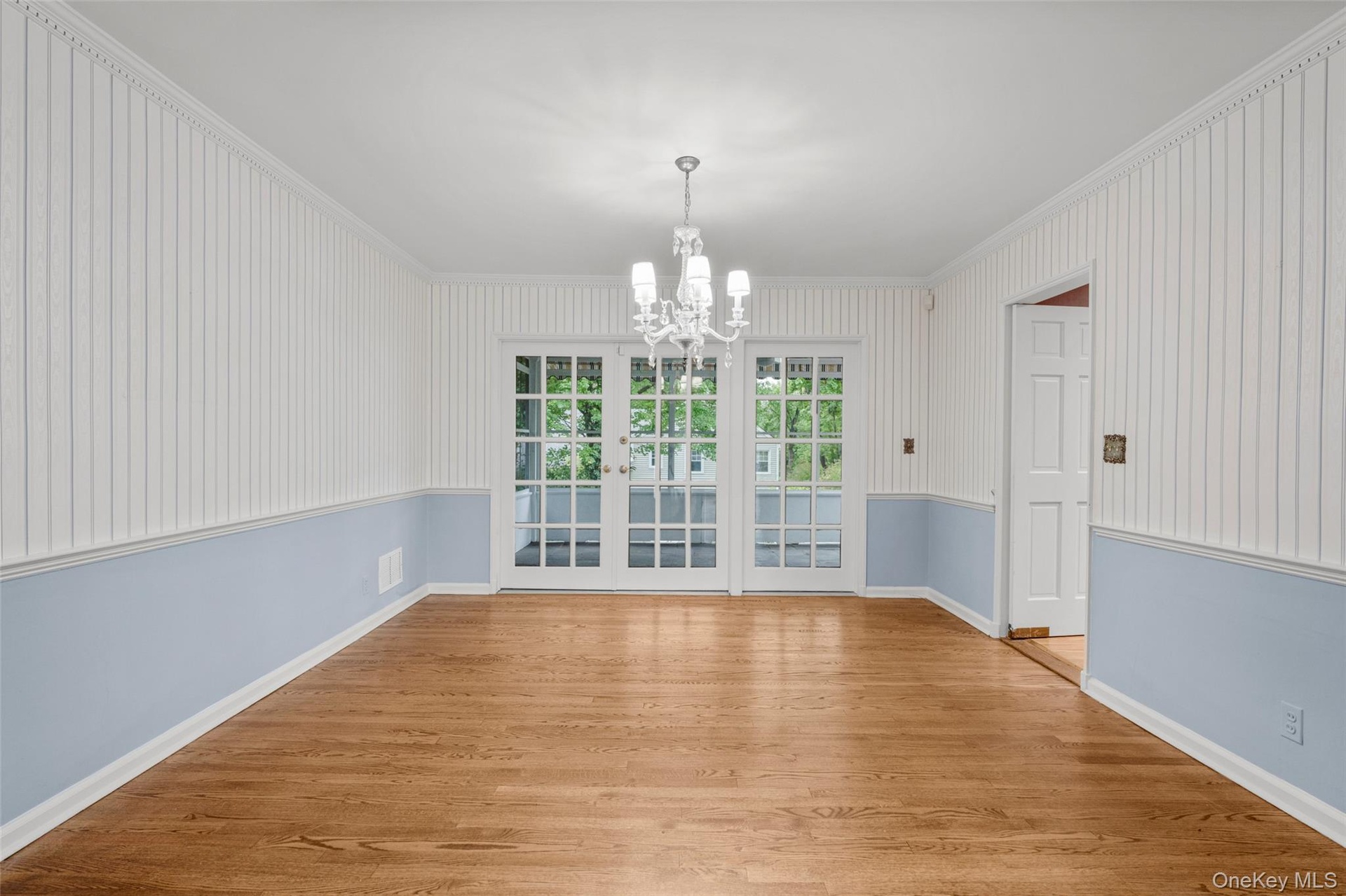 With french doors to screened in porch.