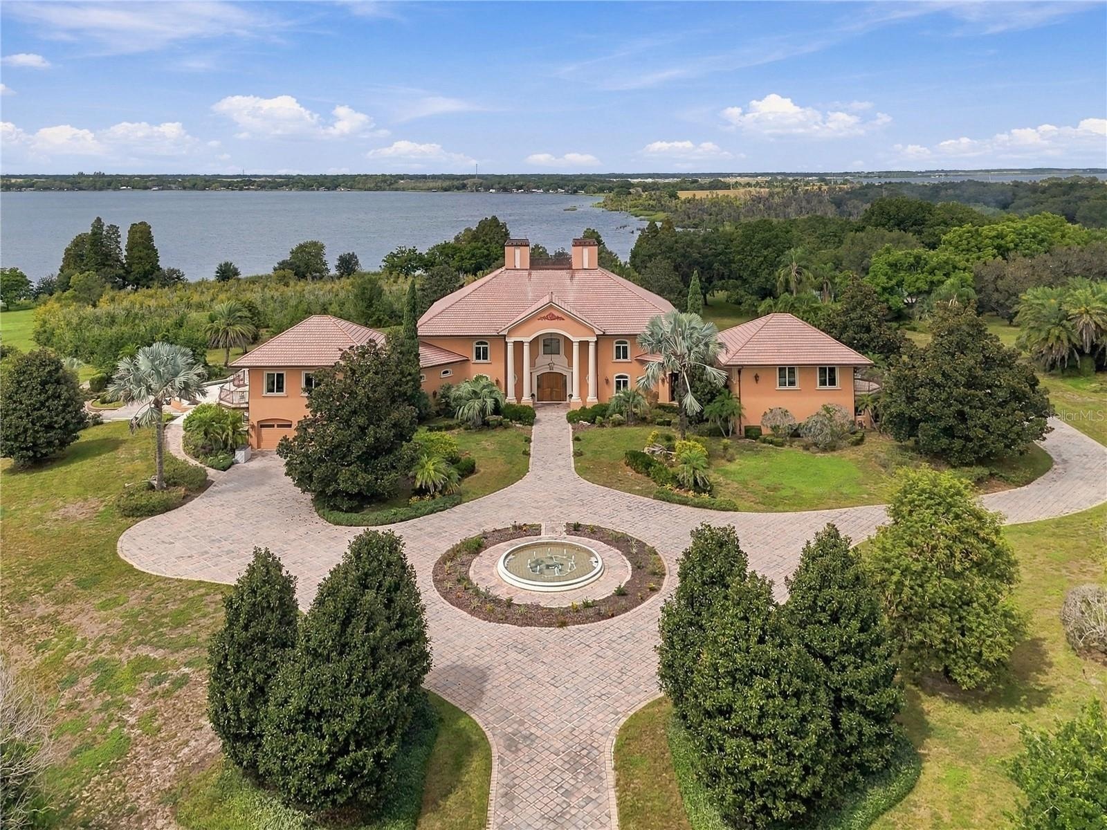 A rare opportunity to own one of Auburndale’s most impressive private estates. Set on 44.30 beautifully landscaped acres with more than 2,300 feet of 