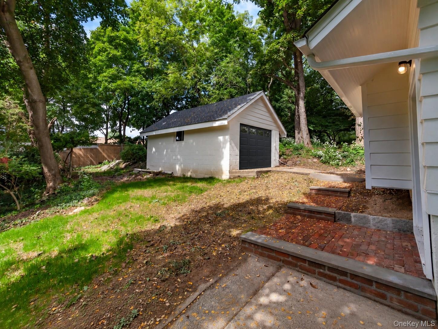 Garage door added by AI but is being replaced by seller.