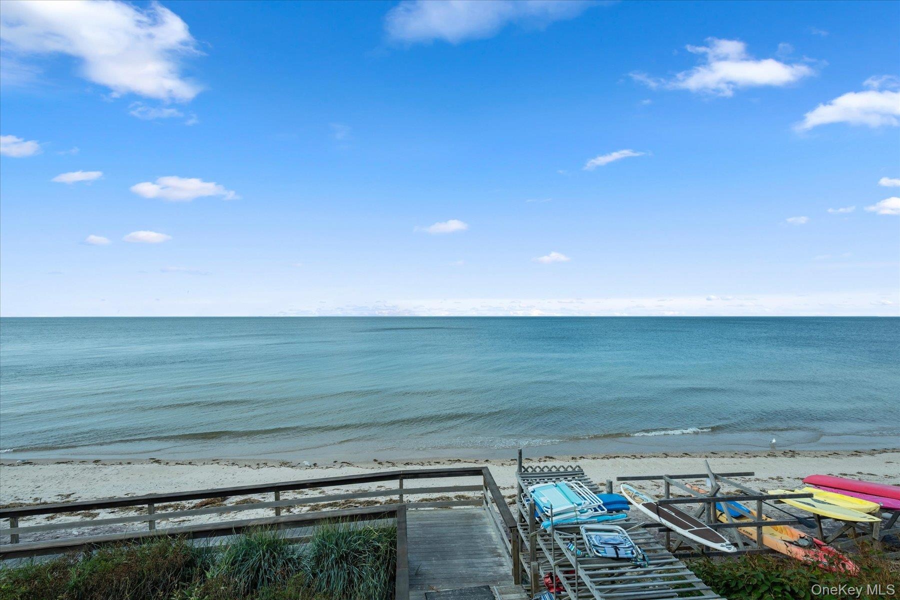 Village Private Beach, Wood walkway with railing overlooking Long Island Sound