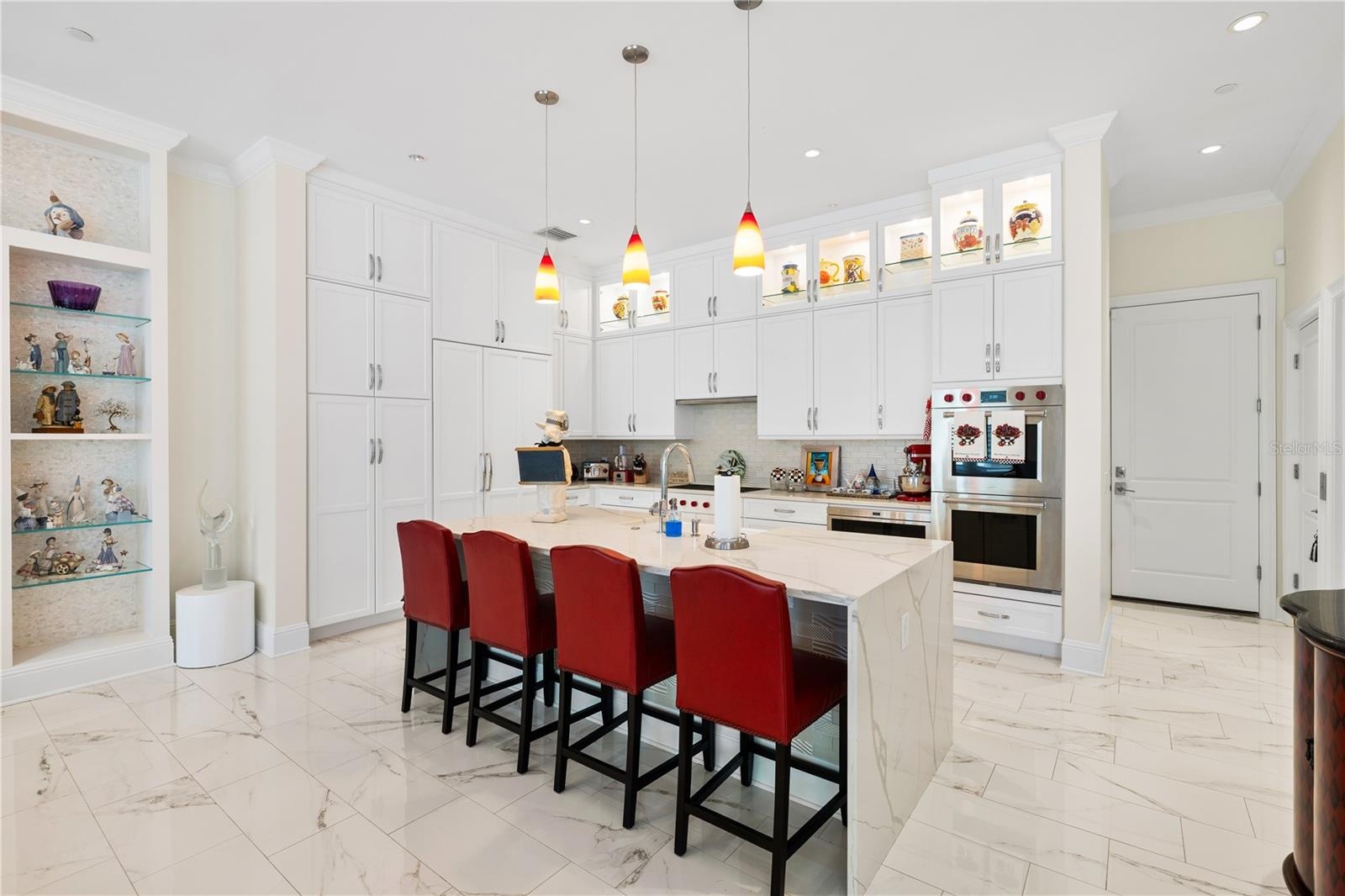 1 Palm Ter Kitchen with waterfall granite island