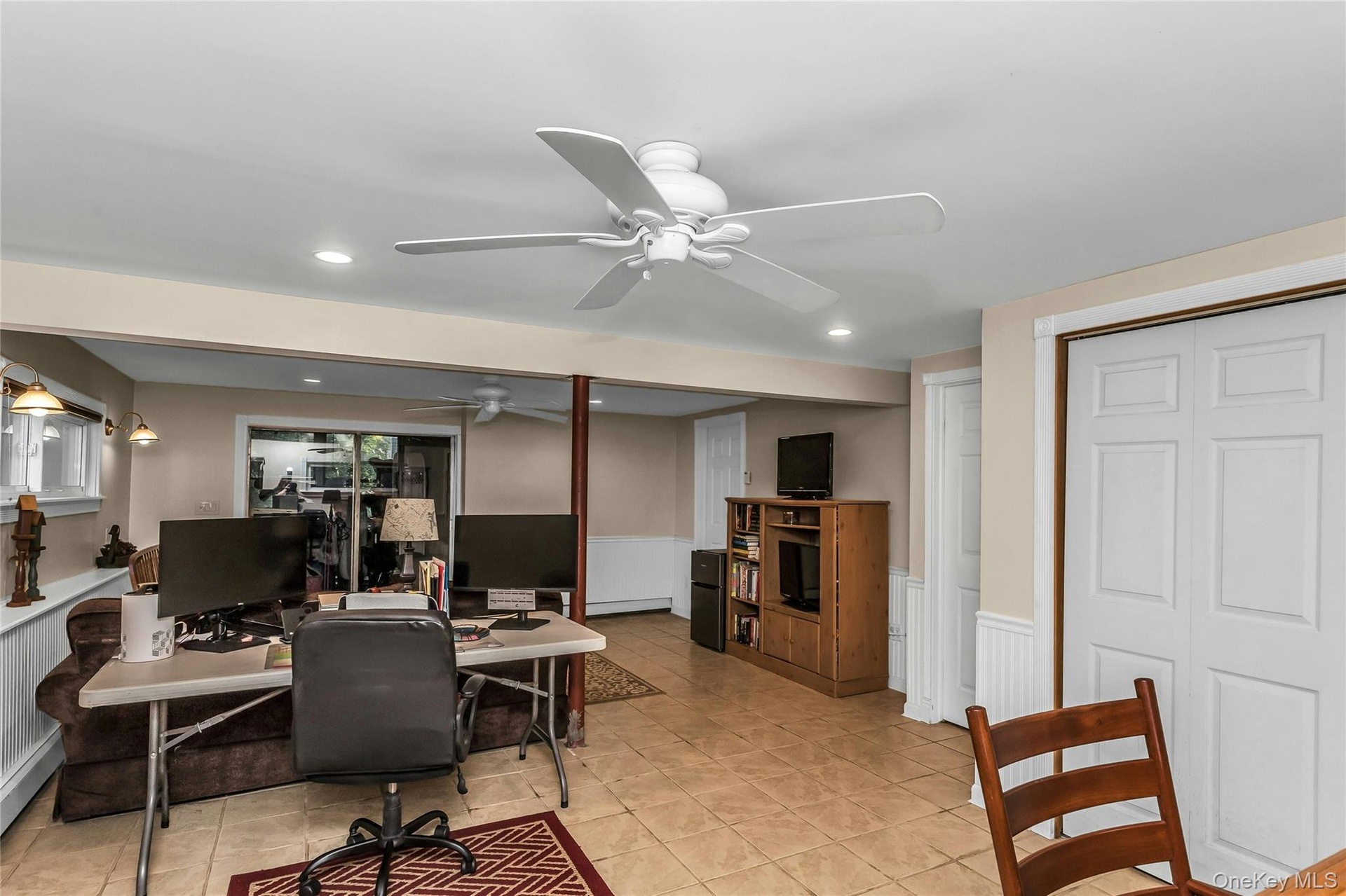 Guest Quarters or 4th Bedroom With Lots of Closets and Sliding Glass Doors Leading to Sunroom With Outside Entrance