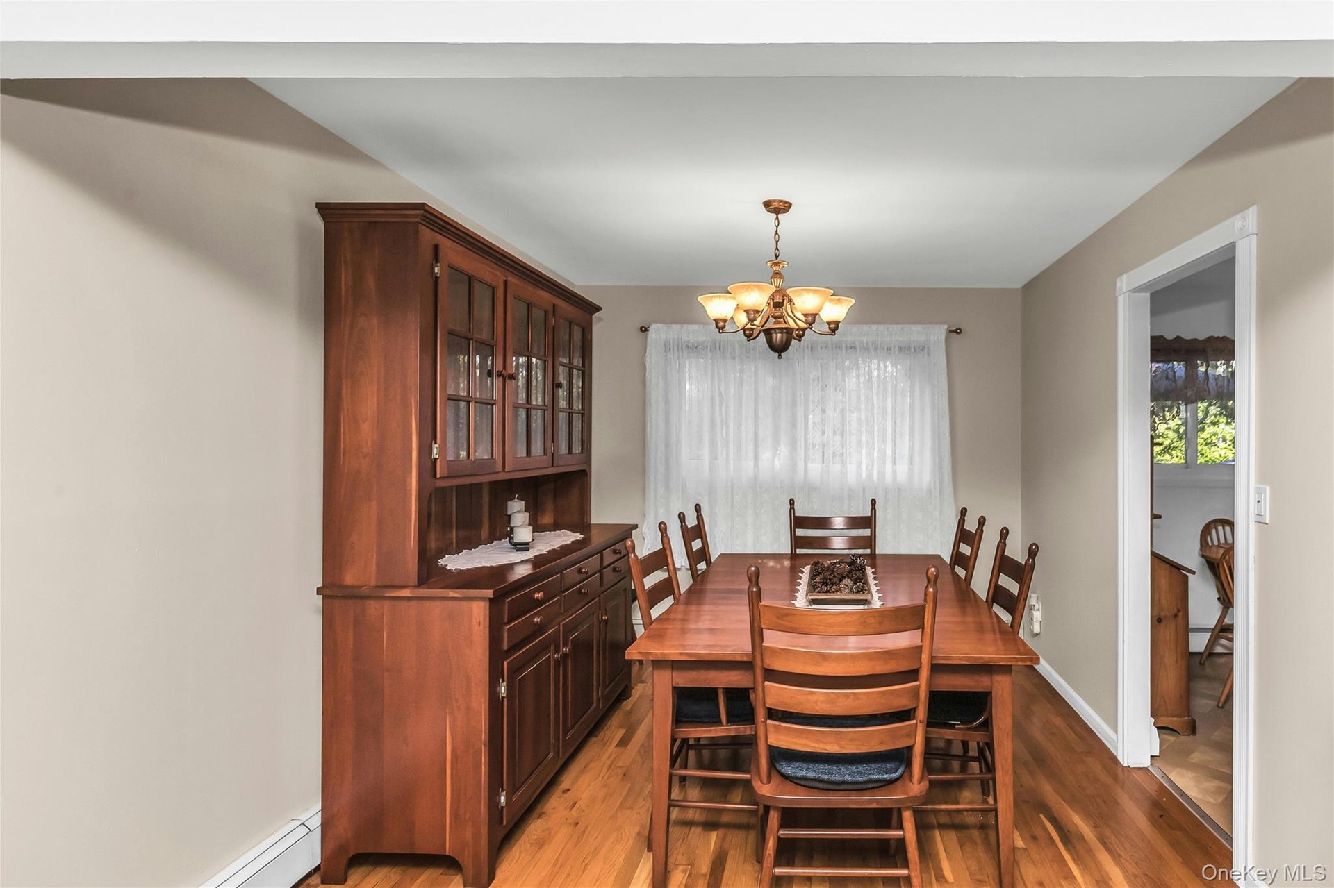 Dining Room With Hard Wood Floors