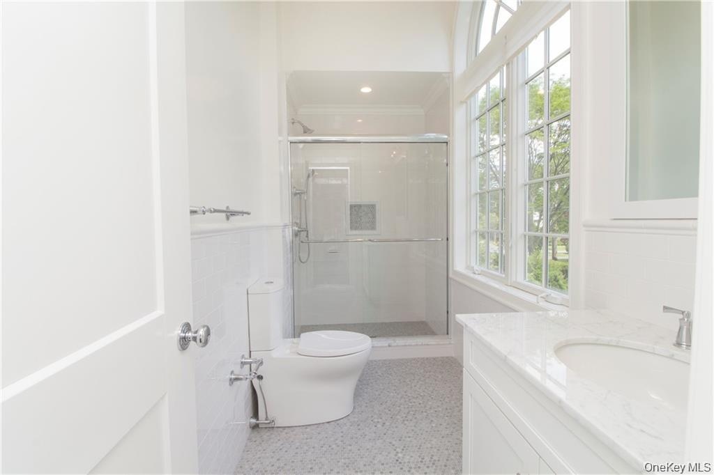Sample of bathroom from another home by this builder