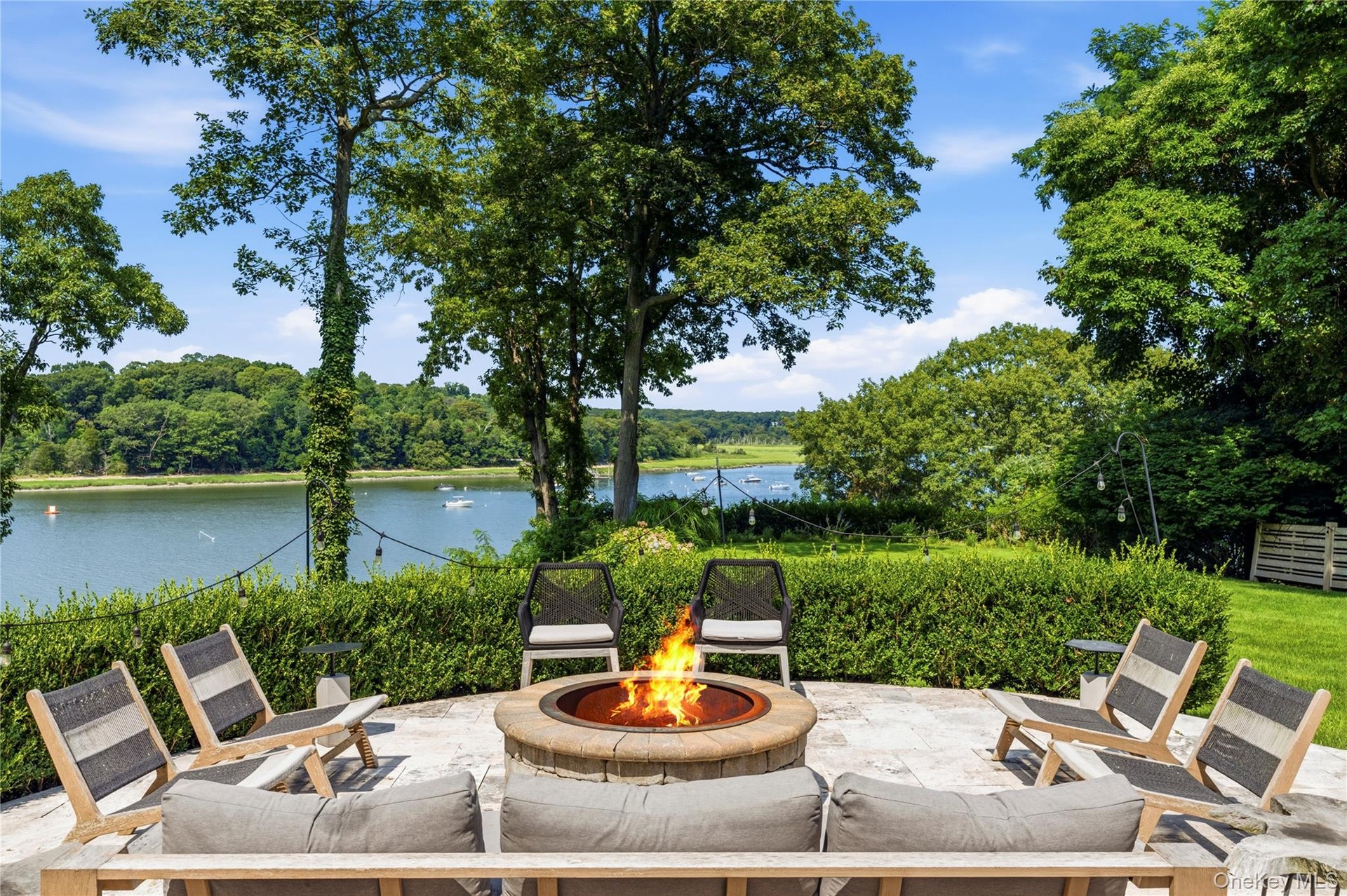 Built in firepit overlooking the water