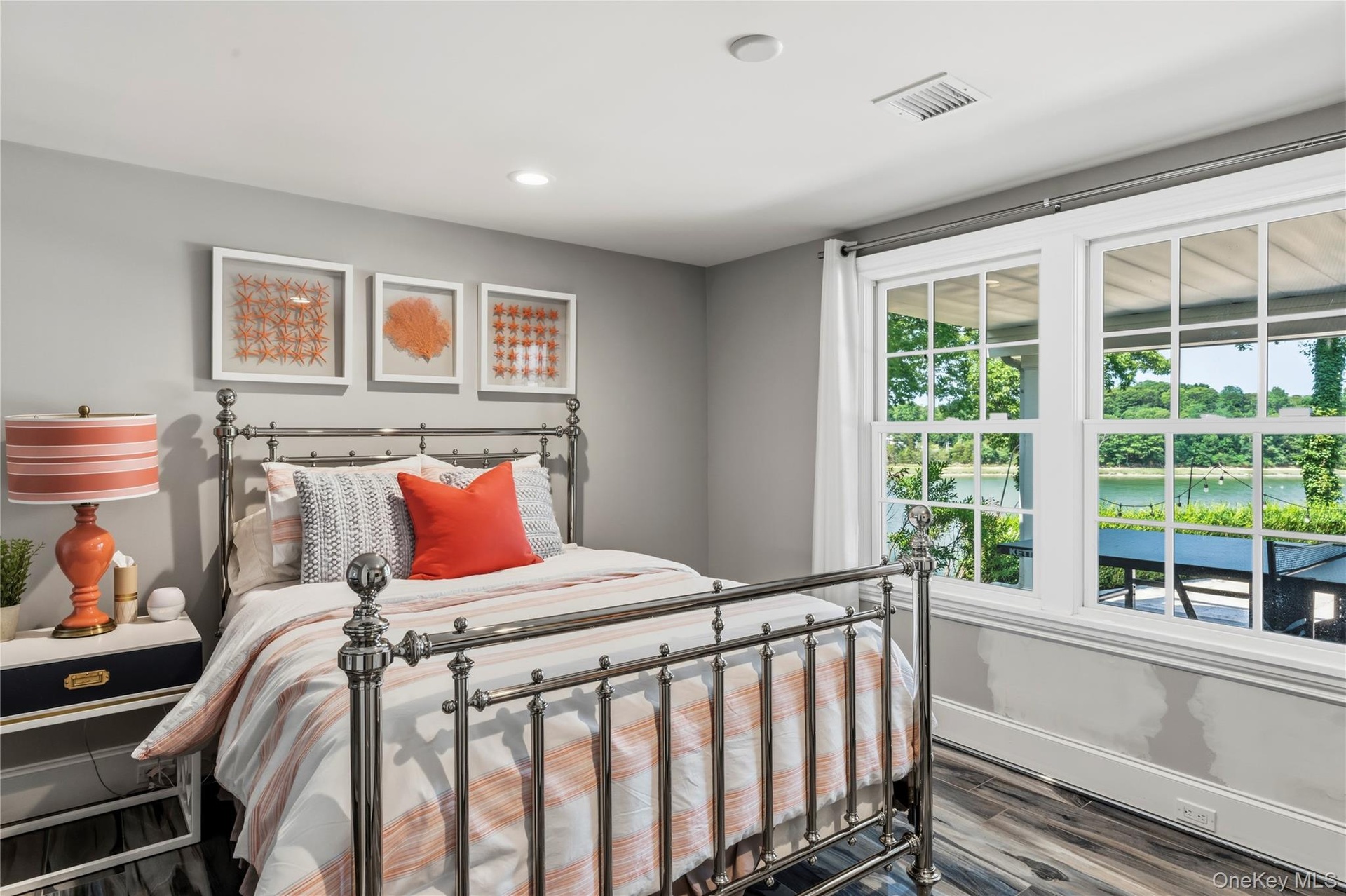Bedroom on lower level with WIC and waterviews