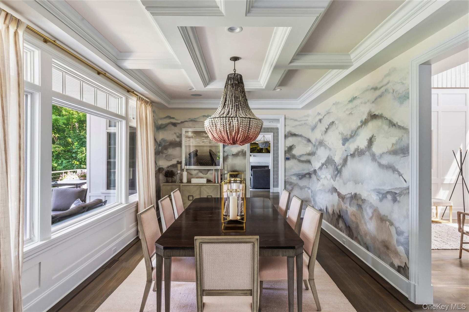 Coffered ceiling with expansive windows with waterviews