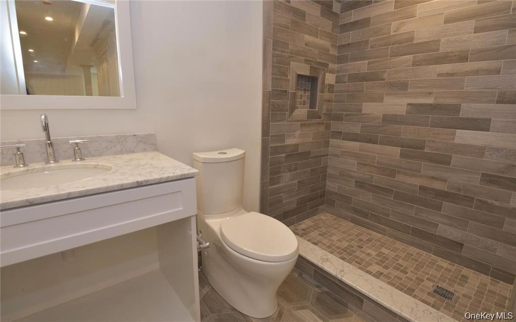 Even the lower level full bath is beautifully finished in homes by this builder (sample)