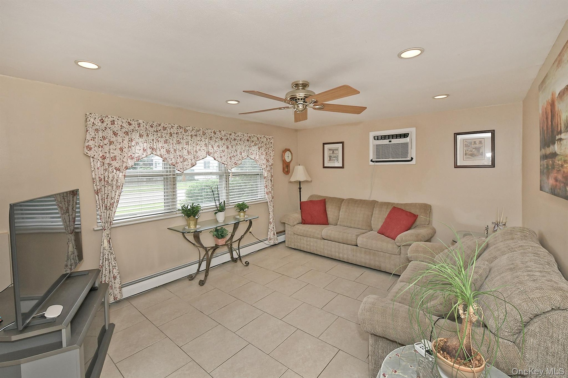 Lower Level Living Room, Recessed Lighting, Ceiling Fan +Tiled Floors
