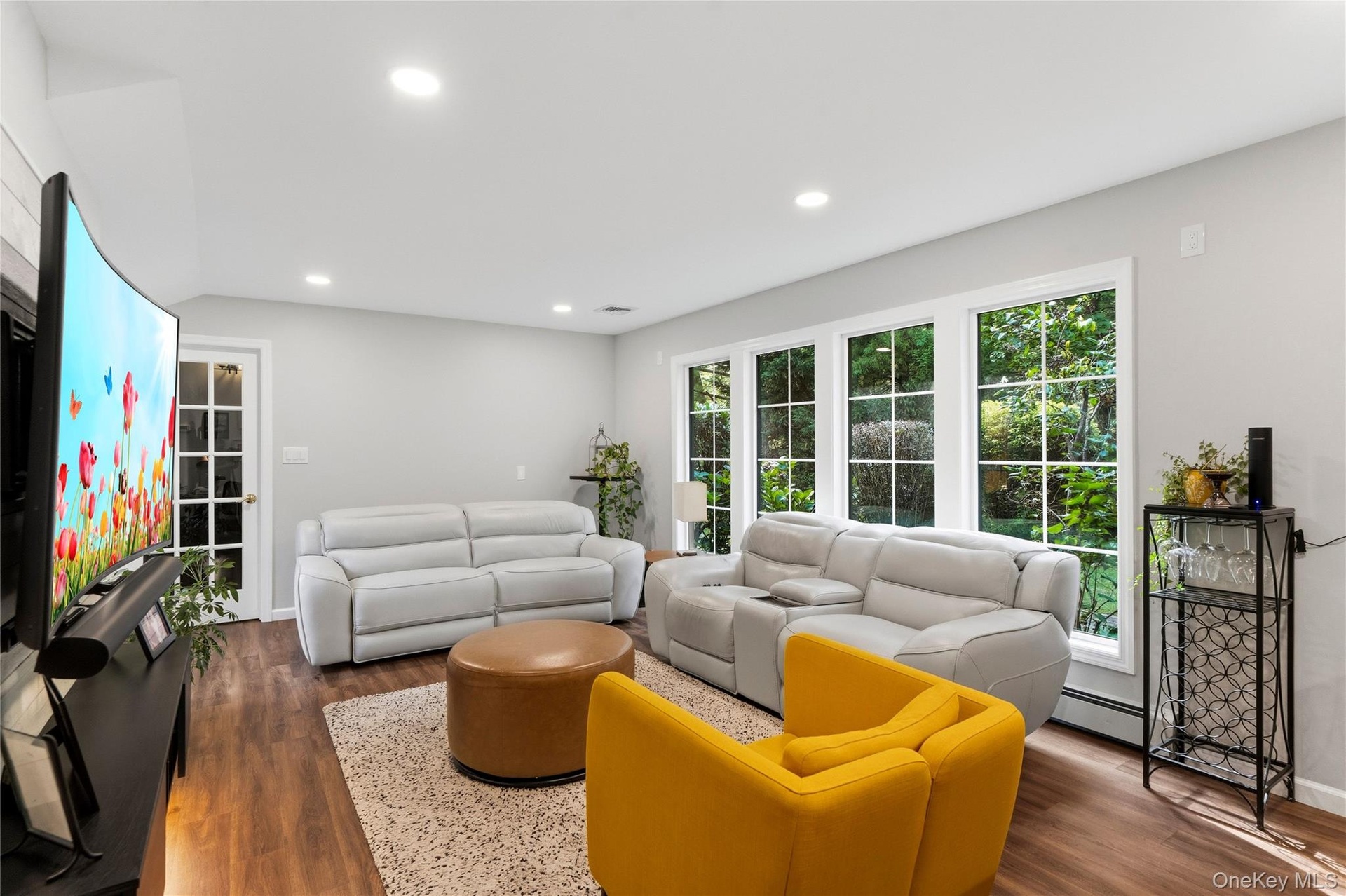 Oversized Windows Frame the Den