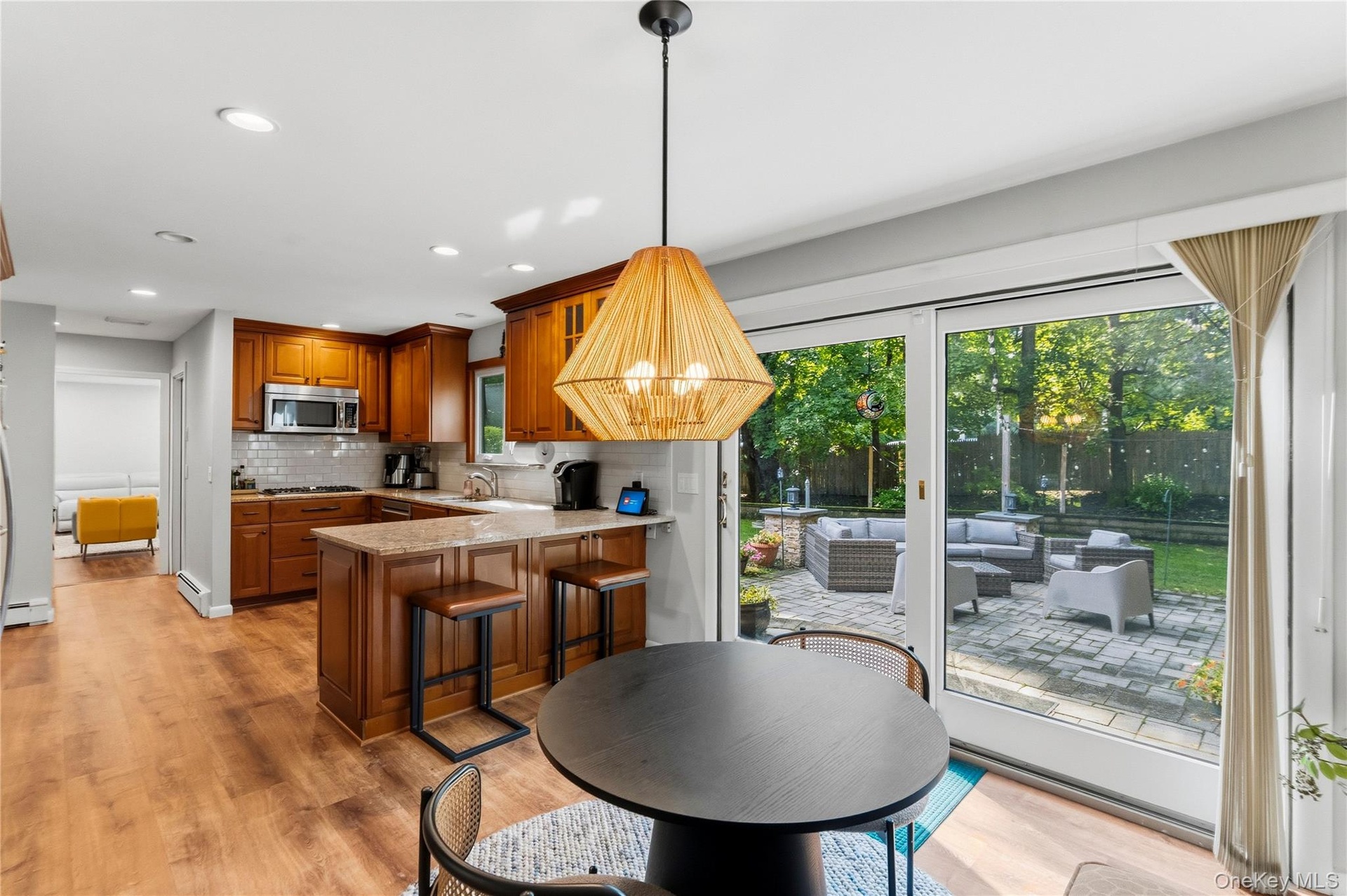 View from Kitchen to Patio and Den