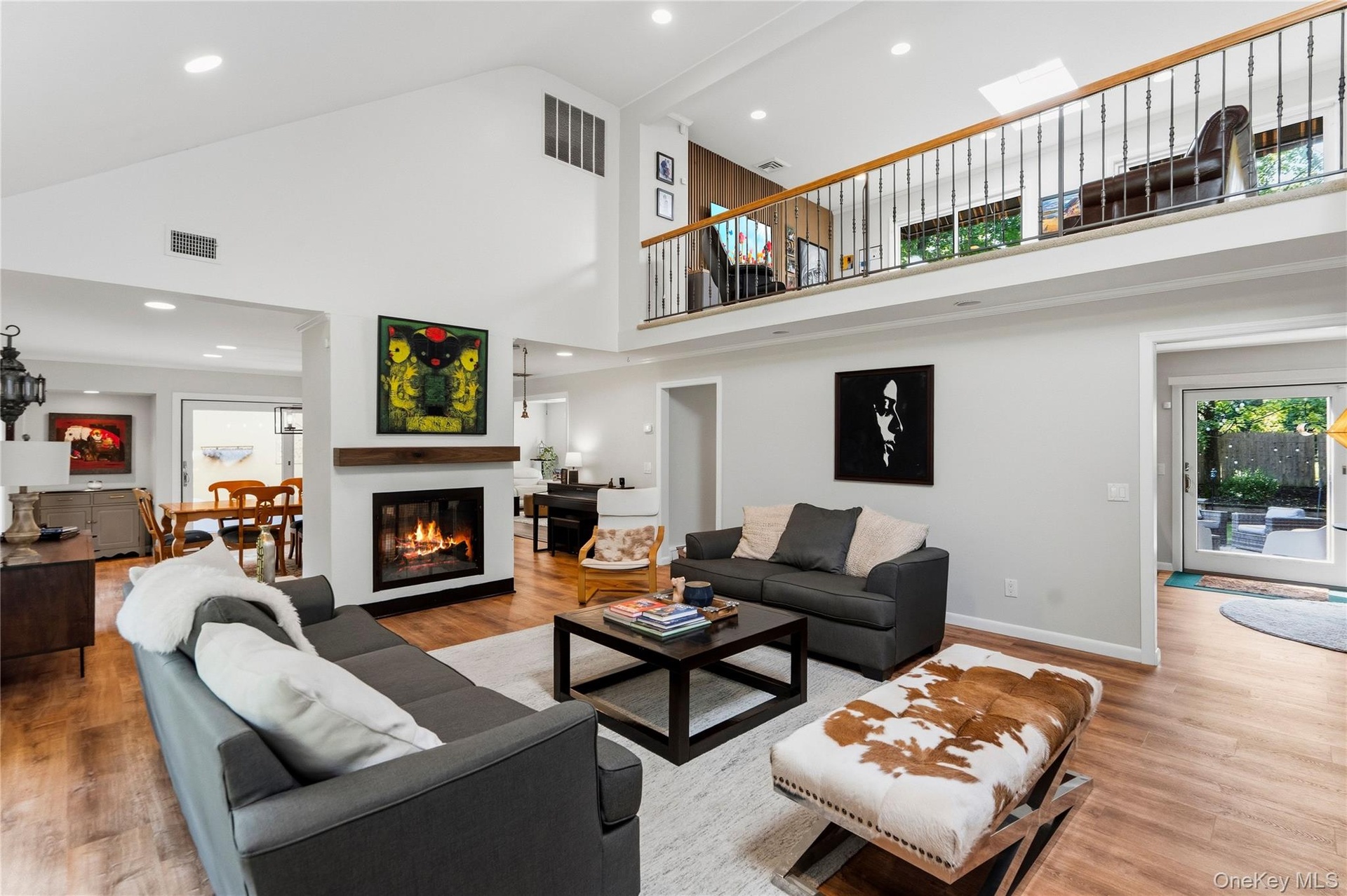 Open Floor Plan with Dramatic Entrance