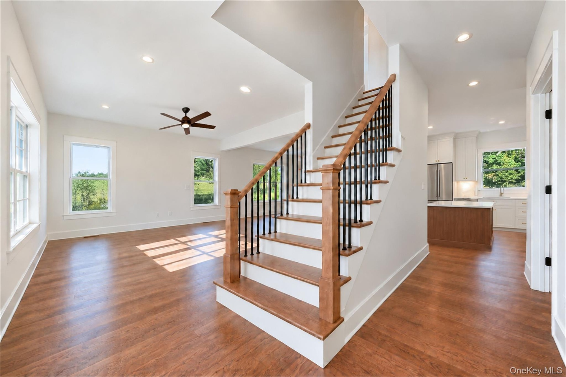 Virtually Staged - Entrance. First Floor will have hardwoods. Railings will have black spindles and oak railing.