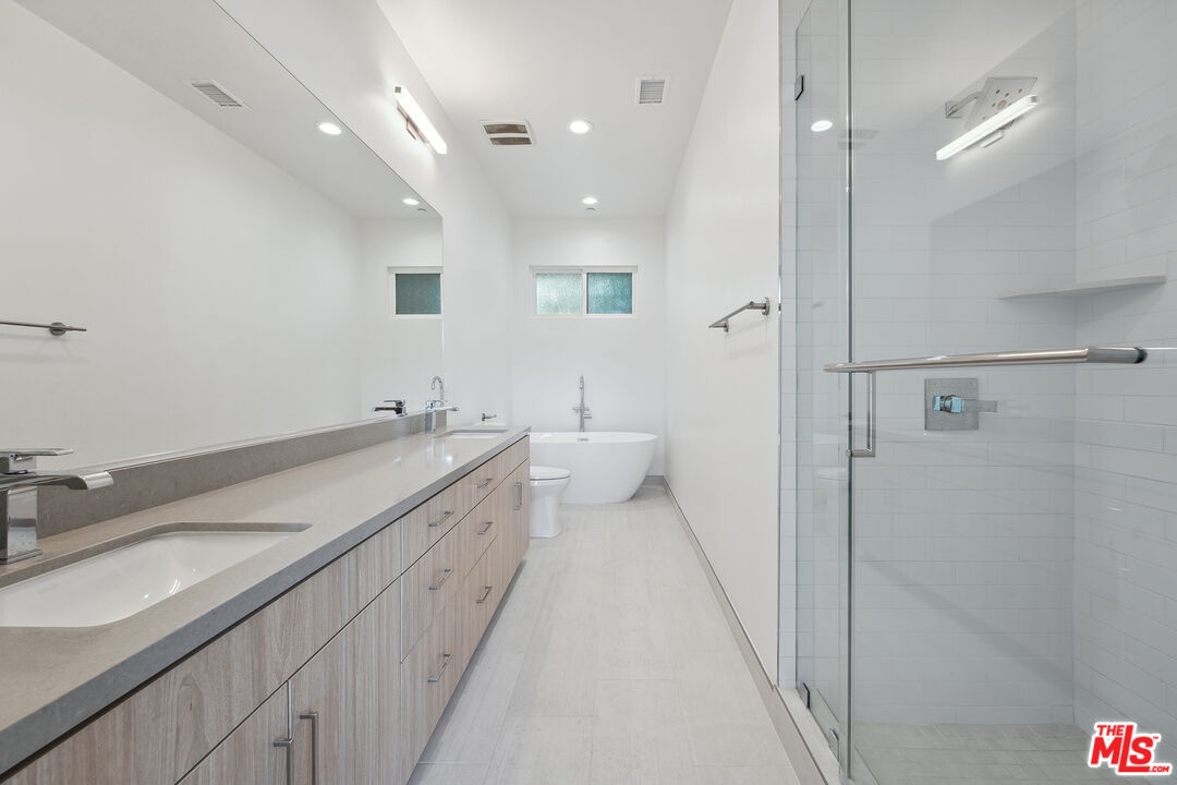 Primary Bathroom with Tub & Wa
