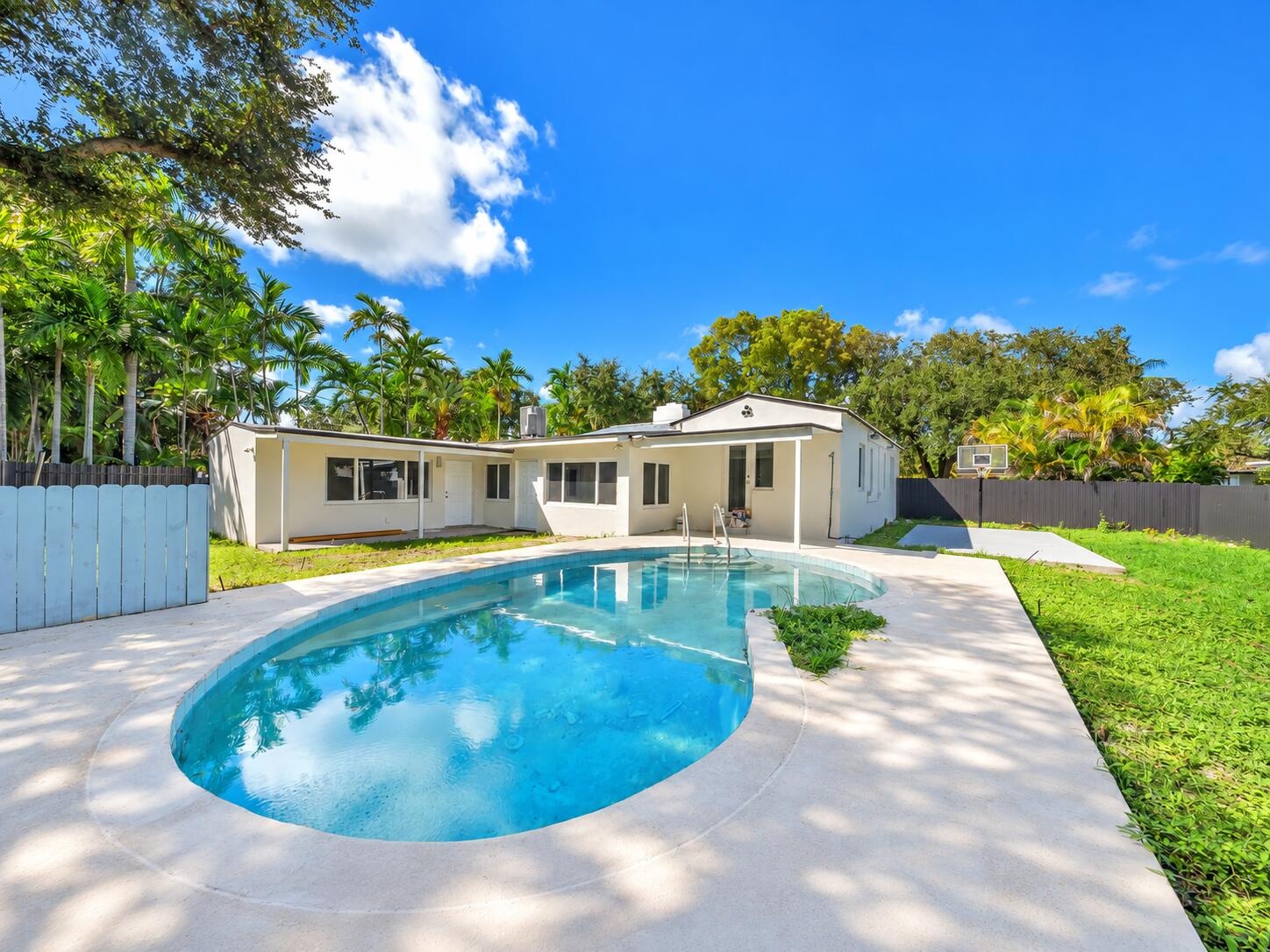 beautiful pool view with extended patio